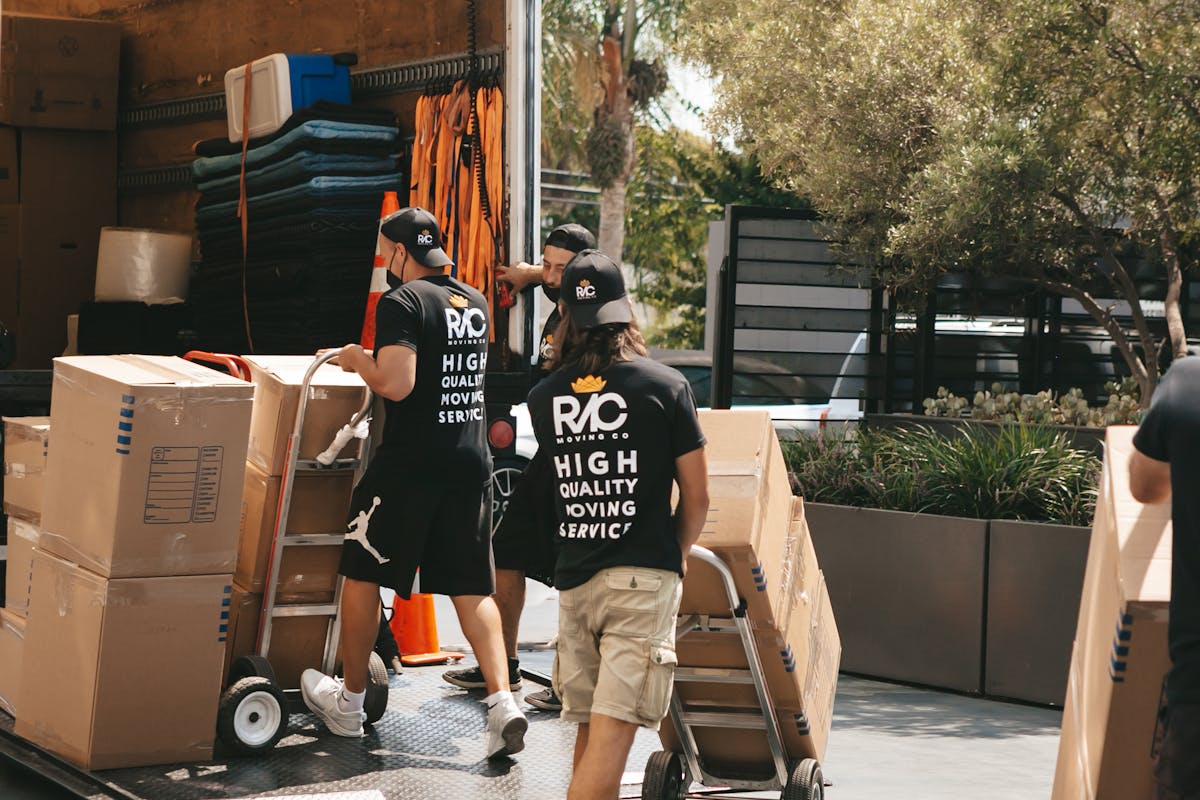 moving staff hauling the client's stuff